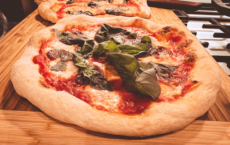 Neapolitan pizzas on a cutting board