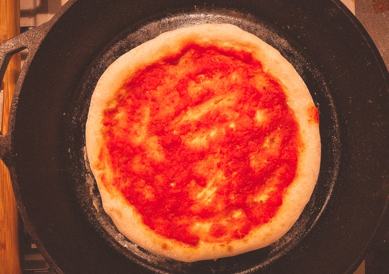 Partially baked, sauce only Neapolitan pizza.