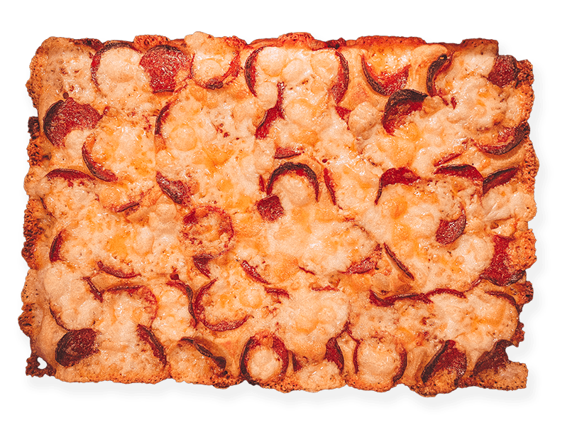 Overhead view of a whole Detroit pizza made with Peter Reinhart's recipe.