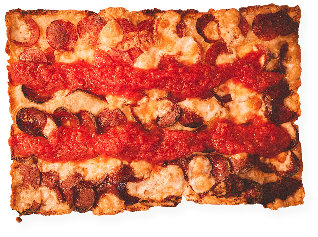 Overhead view of Detroit style pizza.